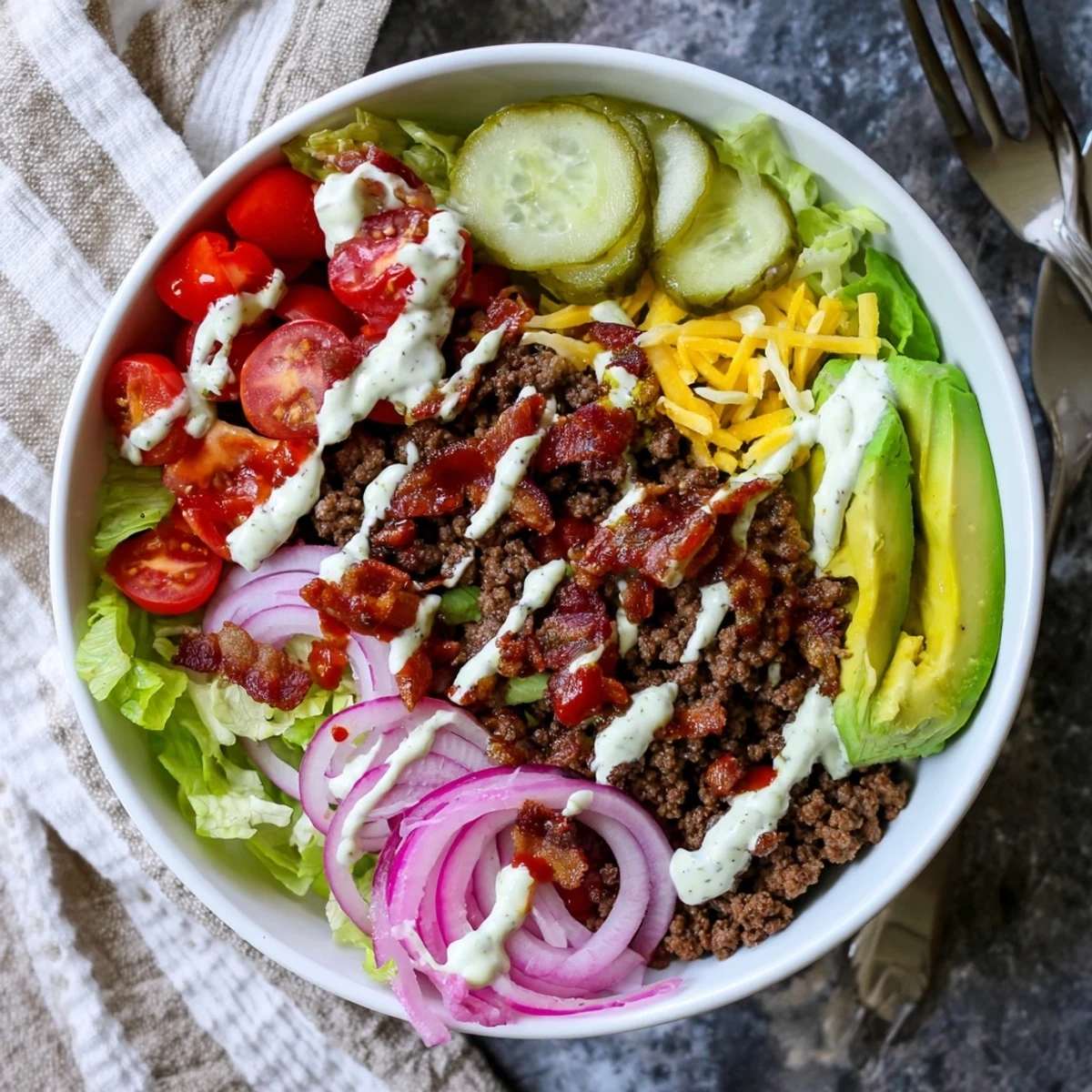 Juicy ground beef burger bowls layered with crisp lettuce, tomatoes, and special sauce.