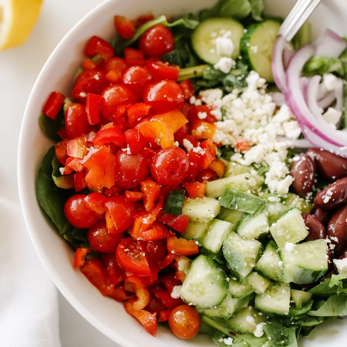 Fresh Salad Recipe with cherry tomatoes, cucumber, and crisp mixed greens.