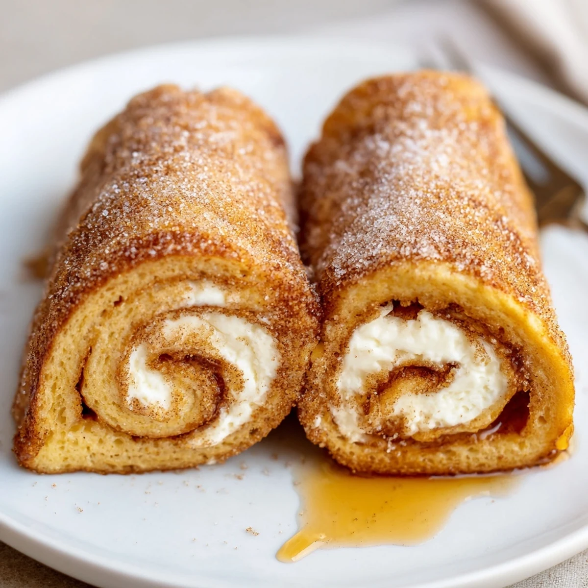 Cinnamon Roll French Toast Roll Ups hand-held brunch treats, buttery and cinnamon-sweet.