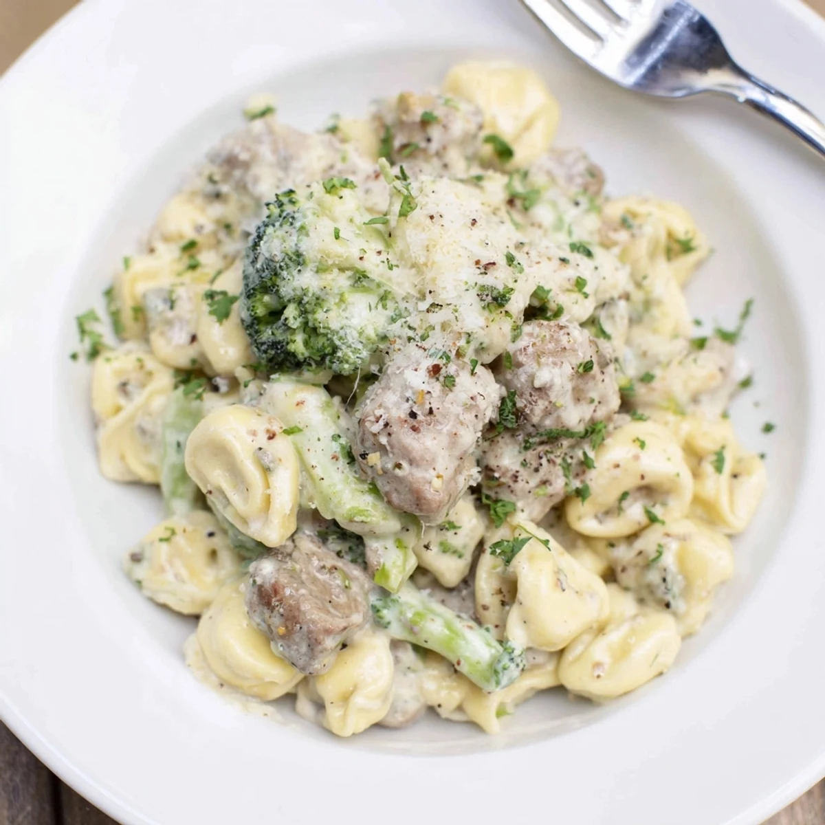 Creamy Garlic Parmesan Tortellini Chicken Broccoli Recipe with golden chicken and tender broccoli