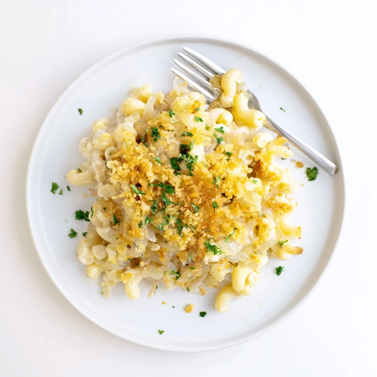 Baked French onion mac and cheese featuring sweet caramelized onions mixed through cheesy pasta